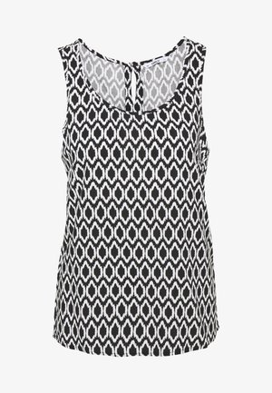Bezrekawnik w czarno-białym wzorze z motywem ikat, okrągłym dekoltem i detalem z wycięciem na plecach. Miękka tkanina o gładkiej fakturze.