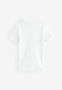 T-shirt en coton blanc à manches courtes, col rond et texture lisse. Pas de logos ou de motifs visibles au dos.