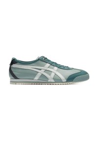 Teal and white leather athletic shoes with a rounded toe, low-profile design, raised textured sole, and side accent stripes.