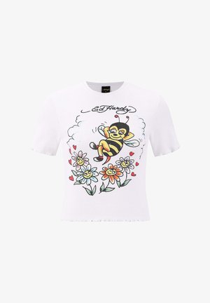 T-shirt bianco a maniche corte con texture a coste, caratterizzato da una grafica colorata di un'ape e fiori con faccine sorridenti, contornati di nero.