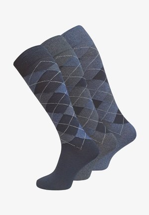 Tre paia di calze tre quarti in diverse tonalità di blu. Due presentano motivo a rombi, mentre una è di un blu navy scuro uniforme. Materiale misto cotone.