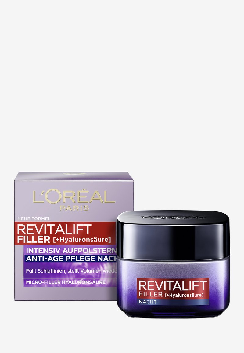 Crema notte L'Oréal Revitalift Filler in un barattolo viola e nero, caratterizzato da una finitura elegante e lucida. Accompagnato da una scatola coordinata.