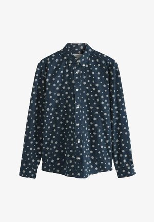 Marineknap skjorte lavet af bomuld, med hvide snefnugsprints. Lange ærmer med knapmanchetter og klassisk kravedesign.