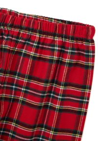 Tela de franela de tartán roja con cinturilla elástica, que presenta un patrón de cuadros en negro, blanco, amarillo y verde.