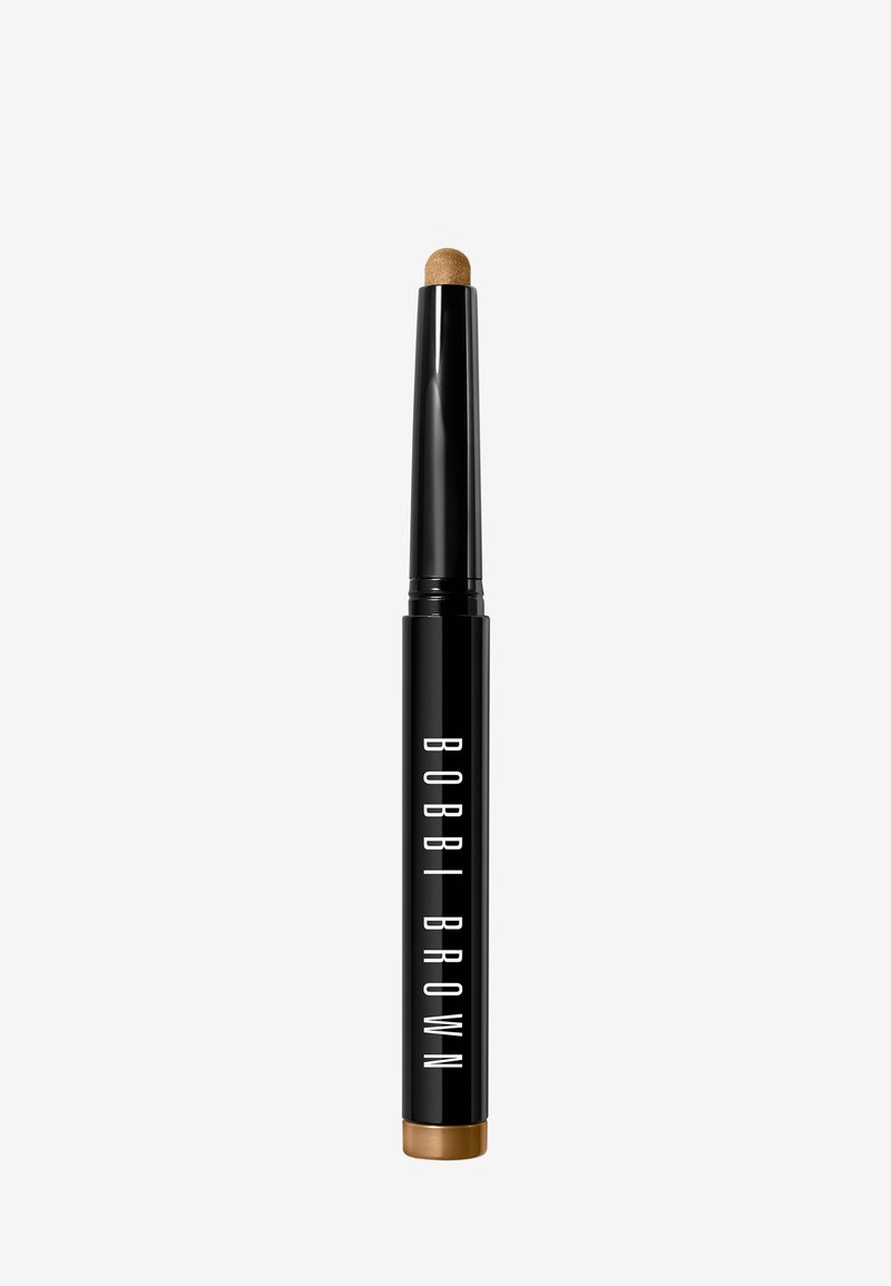 Bobbi Brown Concealer-Stift in einem schwarzen Rohr mit goldenem Fuß. Die Spitze ist rund und cremig-weiß, entworfen für eine präzise Anwendung.