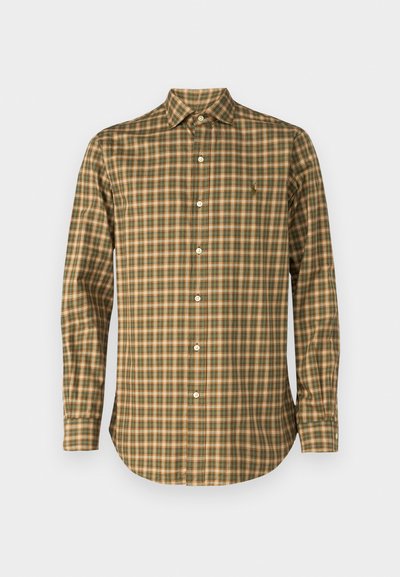 Brown and green plaid long-sleeve shirt with a collar, featuring a rounded hem and front button closure. Light texture, no significant accents.