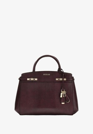 Sac à main en similicuir bordeaux avec motif texturé, double anses supérieures, ferrures dorées et breloque amovible. Logo à l'avant.