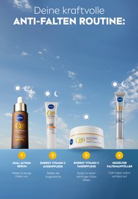 Four skincare products displayed against a blue sky: a dark brown serum bottle, a white cream jar, and two white tubes. Clear labeling visible.