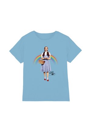 Blue T-shirt with a girl in a blue dress holding a wicker basket, standing in front of a rainbow with "The Wizard of Oz" text below.