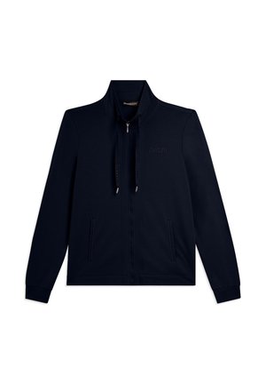 Veste noire zippée avec col montant, cordons de serrage, poches latérales, et logo "FREDDY" discret sur la poitrine gauche.