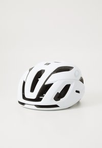 White bicycle helmet with black interior, aerodynamic design, multiple ventilation holes, and adjustable straps for secure fit.
