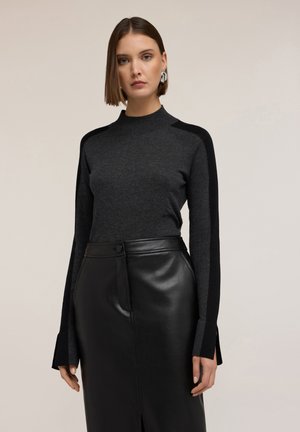 - Sweter