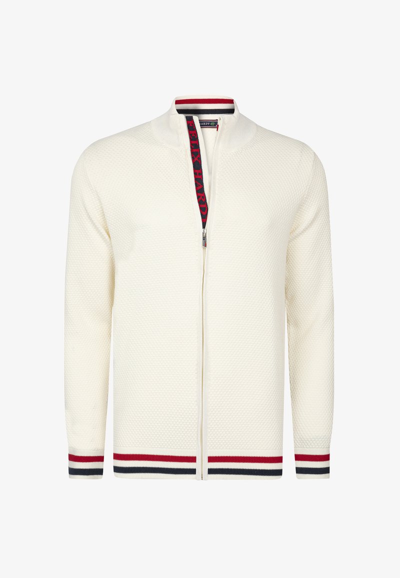 Bílý texturovaný svetr na zip s stojáčkovým límcem, s patterned zipem a pruhovanými manžetami v červené a námořnické modré barvě.
