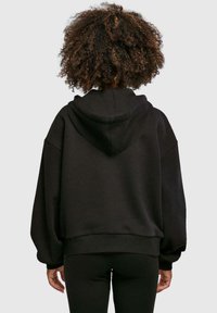 Merchcode MOTHERS DAY - SHE IS  - Hoodie - black