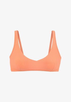 Bránička v broskyňovej farbe s jemným žebrovaním, s výstrihom do U a tenkými ramienkami, ktorá má bezšvovú konštrukciu a hladkú textúru.