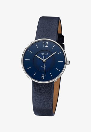Montre pour homme avec bracelet en cuir bleu foncé, boîtier argenté, cadran minimaliste bleu foncé, index des heures argentés et trois aiguilles argentées indiquant 10 h 09 min 30 s.