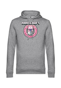 Felpa grigia con cappuccio caratterizzata da un design pixelato di Minecraft, con un personaggio all'interno di un distintivo circolare. Include lacci e polsini a coste.