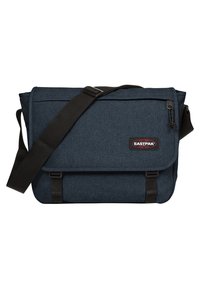 Borsa a tracolla blu scuro realizzata in tessuto testurizzato, con tracolla regolabile, chiusura a patta e patch del logo Eastpak sulla parte anteriore.