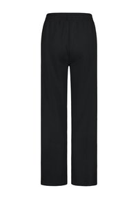 Schwarze weite Hosen aus weichem Stoff, mit einem elastischen Bund und ohne sichtbare Muster oder Akzente. Rückansicht gezeigt.