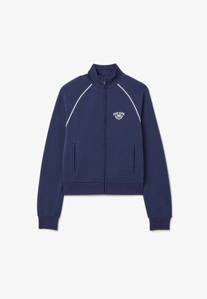 Marineblauwe ritssluiting sweatshirt met hoge kraag, witte piping details, voorkruiszakken en geborduurd "New York 96" logo op de borst.