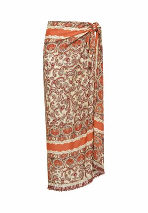 Jupe portefeuille à motif cachemire orange et crème, avec une attache latérale et un ourlet à franges.