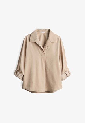 Blusa beige con bottoni, colletto, maniche arrotolate e vestibilità rilassata. Realizzata in tessuto leggero con texture liscia e un leggero luccichio.