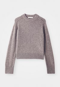 Vaaleanruskea neULE, jossa on pitkät hihat, ribbireunat ja pyöreä pääntie.