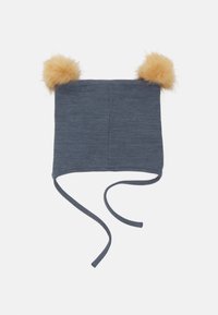 Um gorro de malha azul escuro com dois pompons fofos na parte superior, cordões laterais para fixação e uma textura suave.