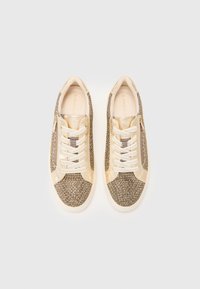 Sneakers with a beige leather trim and gold-brown textured fabric. Featuring white laces and a side zipper for easy wear. Size 37.