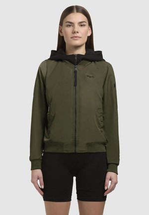 Olive green bomber jacket with a black hood, zip closure, ribbed cuffs and hem, and side pockets. Soft, smooth material with subtle branding.