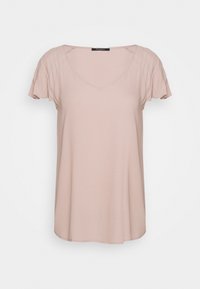Jasnoróżowa bluzka z krótkim rękawem i dekoltem w serek, wykonana z gładkiego materiału. Posiada subtelne plisowania na ramionach oraz luźny krój.