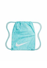 Sac à cordon bleu clair en nylon lisse, présentant un logo Nike blanc et un motif de texte répété dans des nuances de bleu.