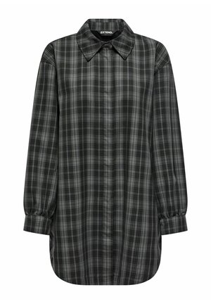 Chemise boutonnée à carreaux noirs et gris, avec un col, des manches longues et des poignets froncés. Présente un ourlet arrondi et une texture de tissu douce.