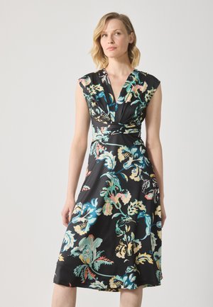 Black floral dress with cap sleeves, featuring a deep V-neck and a fitted waist. Colorful tropical patterns in blue, pink, and green accent the fabric.