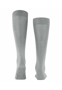 Graue knielange Socken aus einem glatten Material. Mit einem gerippten Bündchen und verstärktem Zehenbereich, mit Branding auf der Sohle.