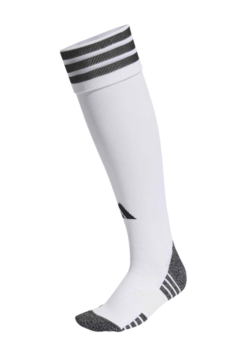 Άσπρες κάλτσες μέχρι το γόνατο με μαύρες ρίγες στη μανσέτα, υφασμένη γκρι μύτη, και αθλητικό σχέδιο με μαύρο λογότυπο στο πλάι.