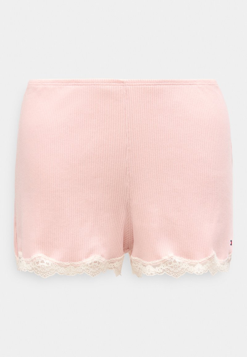 Pantaloncini di cotone rosa chiaro con texture a coste, caratterizzati da un bordo decorativo in pizzo sull'orlo e spacchi laterali per un dettaglio aggiuntivo.