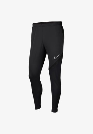 Pantalon de sport noir fuselé avec taille élastique et logo Nike sur la partie haute de la cuisse, doté de panneaux en mesh pour la ventilation.