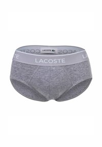 Sous-vêtements pour hommes gris avec une ceinture grise portant la marque "LACOSTE". Fabriqués en tissu doux, conçus avec une forme ajustée et une texture lisse.