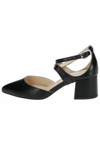 Chaussure noire en cuir à talon bloc avec un bout pointu et des sangles croisées autour de la cheville, dotée d'une fermeture à boucle et d'une texture lisse.