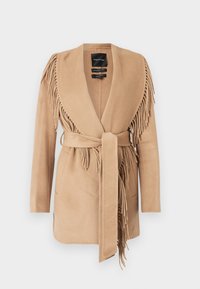 Beige franjeeritud ülerõivas, mis on valmistatud pehmest kangast, omad shawl krae, sidumise pannal ja kaks esist taskut.