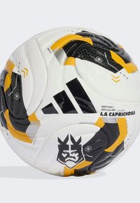 White soccer ball with black and yellow accents, featuring a textured surface, geometric patterns, and a bold graphic of a character.