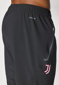 adidas Performance JUVENTUS VISTECH - Pantalon de survêtement - black/bliss pink