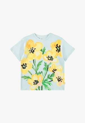 Lyseblå bomuld T-shirt med livligt gult blomsterprint med sorte midterdele og grønne blade. Korte ærmer, afslappet pasform.