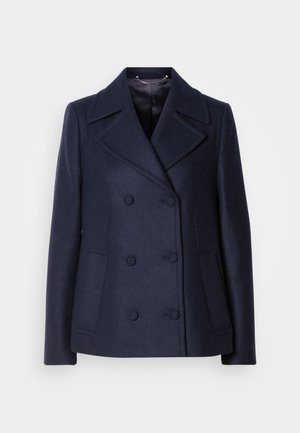 Tumed villane peacoat, mis sisaldab kahekordset nööpide rida, nurgelisi krae, kahte esist taskut ja siledat voodrit.