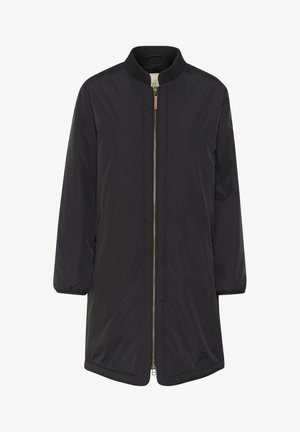 Svart, lätt jacka med ribbad krage, dragkedja, långa ärmar och sidofickor. Har ett slätt, vattenavvisande material.