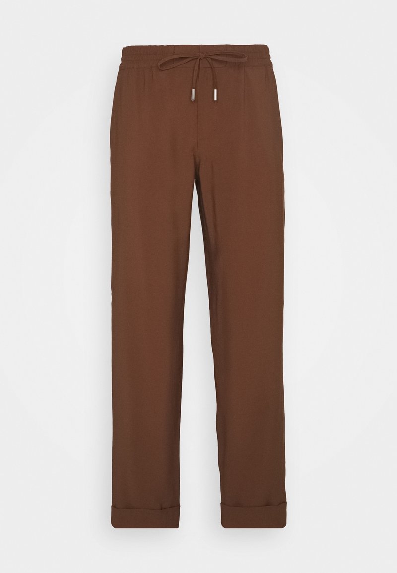 Brown trousers with a drawstring waistband, tapered legs, and rolled cuffs. Made from a smooth, woven fabric with a matte finish.