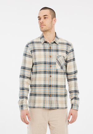 Langarm lakenhemd in beige, blauw en bruin. Heeft een knoopsluiting aan de voorkant, een borstzak en een zachte, gestructureerde stof.