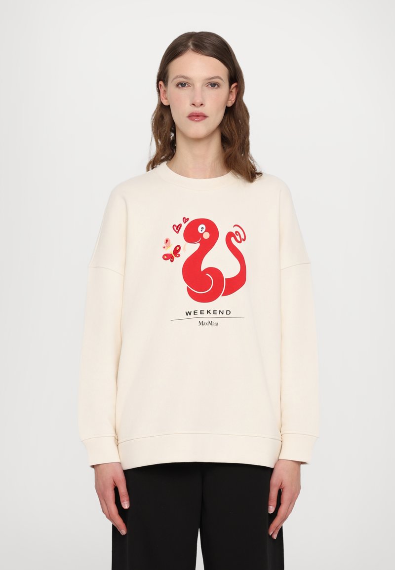 Helles beiges Sweatshirt mit einem großen roten Cartoon-Schlangengrafik, dem Text "WEEKEND" und einem schwarzen Markenlogo am unteren Rand.
