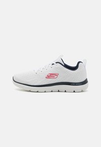 White athletic shoe with mesh upper, navy accents, light cushioning, and textured sole. Features laces and "S" logo on the side.